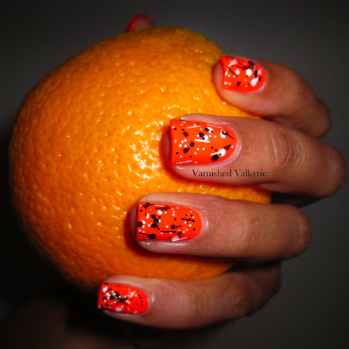 varnishedvalkyrie:

I never wear orange nail polish.  But when I realized it was Jason Orange’s Birthday I thought “Today is the day”.  I’m also holding an Orange. Because why stop at Orange polish. And it can be considered art I suppose.
