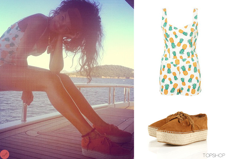 Rihanna enjoying her vacation in Italy on a yacht with close friends, she shared a photo with her fans on instagram. Posing in one of her favourite brands Topshop. She wore a pineapple print play-suit (currently sold out) worn with a pair of klive flatform espadrilles for £55.00 (also in blue and silver) and accessorised with a visor in the colour tan by Fleet Ilya for £215.00. Great summer look she&#8217;s put together!