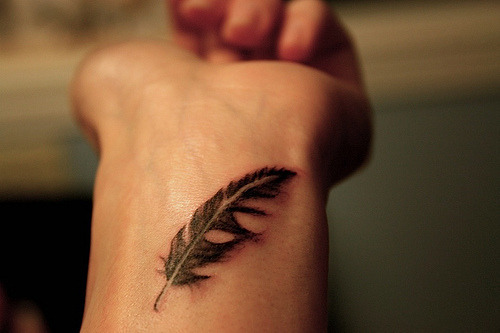 feather tattoo wrist