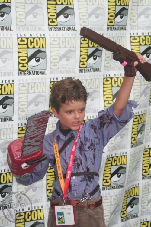 Ash from The Evil Dead with his fake gun and chainsaw and I-Will-Fuck-You-Up expression is probably my favorite kid cosplay from SDCC 2012 thus far.