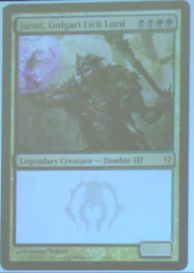 Jarad, Golgari Lich Lord - to be featured in Return to Ravnica and Duel Decks: Izzet vs. Golgari
R U M O R  -  O N L Y   (based on that Japanese packaging spoiler)
Jarad, Golgari Lich Lord, bbgg Legendary Creature - Elf ZombieJarad, Golgari Lich Lord gets +1/+1 for each creature card in your graveyard.bg, Sacrifice another creature you control: Each opponent loses life equal to the power of the sacrificed creature.P/T ?