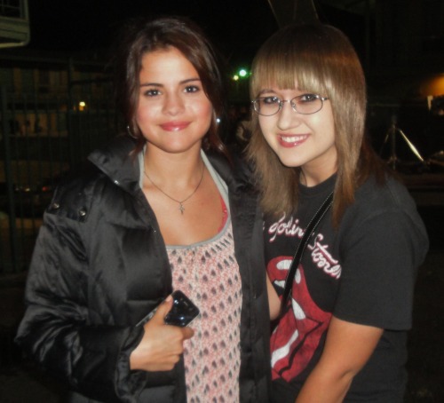Selena and a fan on the set of Feed the Dog