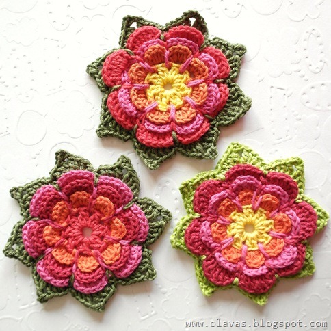 Check out this lovely crocheted flower from Olavas Verden!
There is a detailed tutorial to be found through the link (although in Norwegian).  Seems pretty clear to follow though, and lovely detailed pics.  Enjoy!