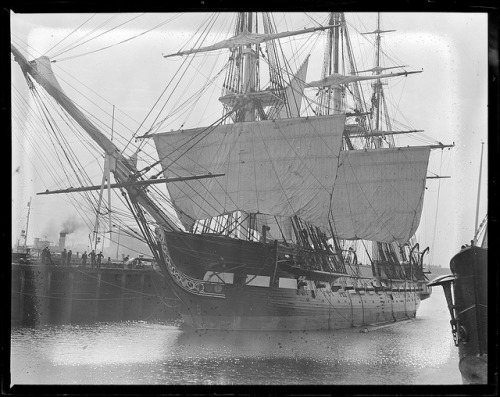 The USS Constitution showing sails at the Charlestown Navy Yard by Boston Public Library on Flickr.