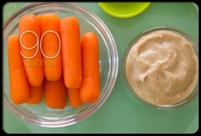 Eight Baby Carrots with Hummus
When you&#8217;re craving a satisfying crunch, dip eight large baby carrots into 2 tablespoons of hummus. Carrots are an excellent source of vitamin A and beta carotene, while hummus adds protein. Pre-packaged baby carrots are convenient, and there are many varieties of hummus available.
Saturated fat: 0.4&#160;g
Sodium: 210&#160;mg
Cholesterol: 0&#160;mg
