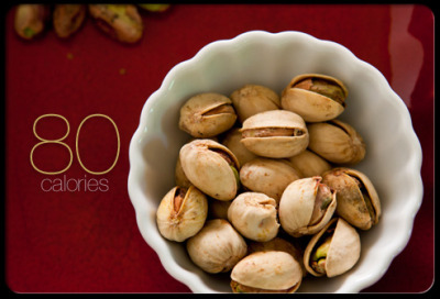 20 Pistachios
Don&#8217;t let the high fat content in pistachios scare you off &#8212; most of the fat is unsaturated or &#8220;good&#8221; fat. Eat 20 pistachios, and you&#8217;ll only take in 80 calories and less than a gram of saturated fat. Plus, they&#8217;re rich in protein, fiber, and several key vitamins and minerals. To avoid an unhealthy dose of sodium, eat them raw or dry roasted without salt.
Saturated Fat: 0.8&#160;g
Sodium: 0&#160;mg
Cholesterol: 0&#160;mg
