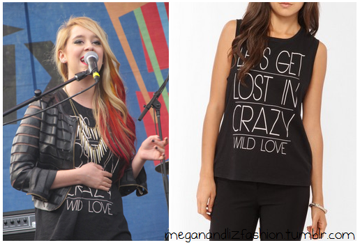 This is the cute black top with white writing &#8220;Lets get lost in Crazy Wild Love&#8221;. (if you&#8217;re looking for her jacket, i&#8217;ve already put it up - look under the jackets tag).You can buy her top here from Forever 21 for $12.80 
