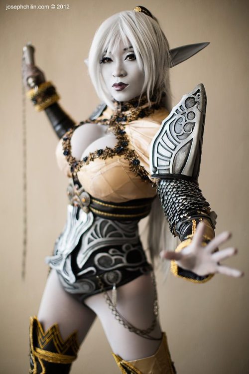 Special Announcement #2 From: Yaya Han (Facebook)

First (badarse) image of my new Lineage 2 – Dark Elf cosplay, by Joseph Chi Lin Photography. I made this for Dragoncon and nearly killed myself finishing it in time. In hindsight, I underestimated the time it would take to complete this costume, and being in Asia for a week right before Dragoncon set me back so much that I had to marathon craft for 3 days straight. It came down to the wire due to me having to re-make parts on the costume because what I thought would work didn’t, and the rainy weather made it hard for paint to dry. This is the first time in several years where I had to finish a costume in the hotel room at the con. Before anyone says how I should not work so hard blah blah… I’m sharing these thoughts because these Project Runway-type deadline-induced experiences are at the core of being an artist, and sometimes our best work is produced in chaos. I’m not talking about starting a costume last minute and half assing it (that shows), I’m talking about challenging yourself to create a finished, polished outfit utilizing new techniques and training yourself to become a faster craftsman with more finesse. I learn more from such projects  I am overall very pleased with this Dark Elf costume, but plan to tweak things to make it easier to wear next time. I’ll post detailed construction notes soon!
