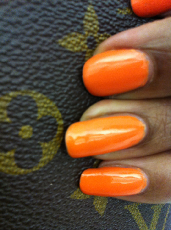 Zoya Arizona. This tangerine color glides on like a gel polish and is very