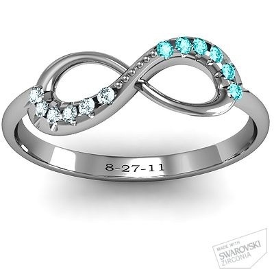 ... cute promise ring!!! An infinity ring with his and her birthstones