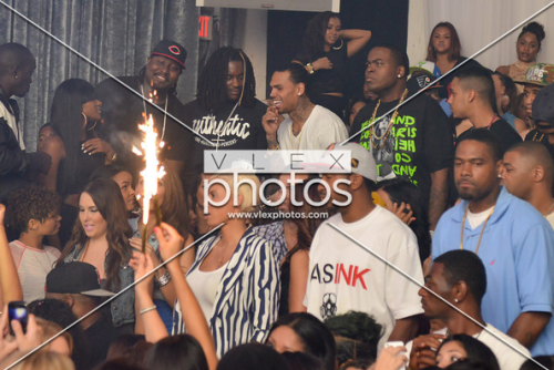 Chris Brown laughing with his freinds at Supperclub last night