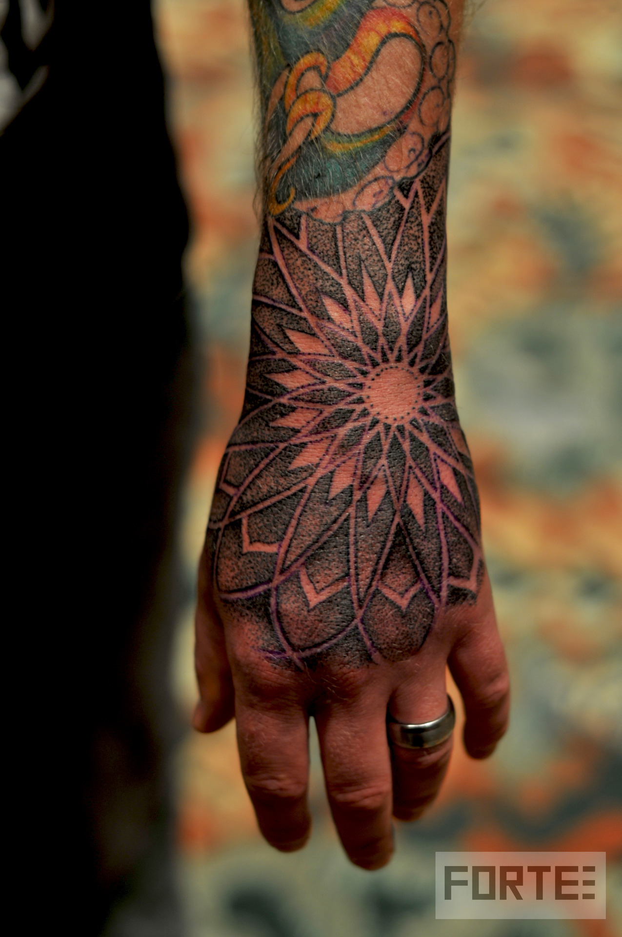 fuckyeahblackwork:

Hand I tattooed at Paradise Tattoo Gathering 2012 in Keystone Colorado.
-Dillon Forte, Sri Yantra Tattoo Oakland CA (www.SacredGeometryTattoo.com)
