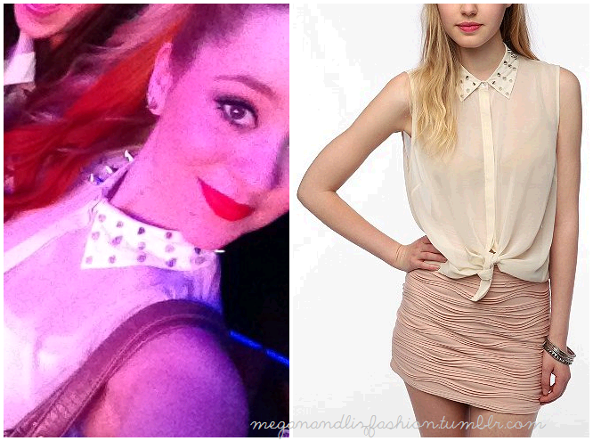 This is white blouse with a studded collar that Liz wears in this twitter picture.You can buy it HERE from Urban Outfitters  for $39