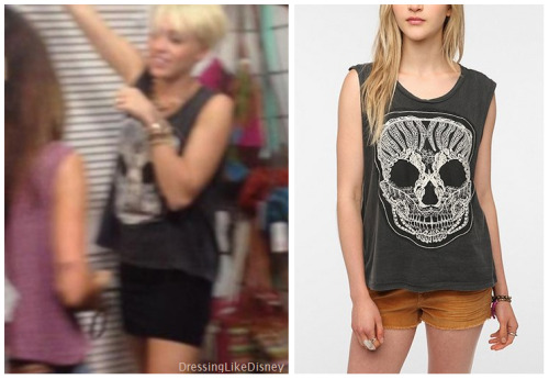 Miley Cyrus Wears this Truly Madly Deeply Lace Skull Muscle Tee. You can buy her cute shirt from Urban Outfitters.    You can buy it HERE for $39.99