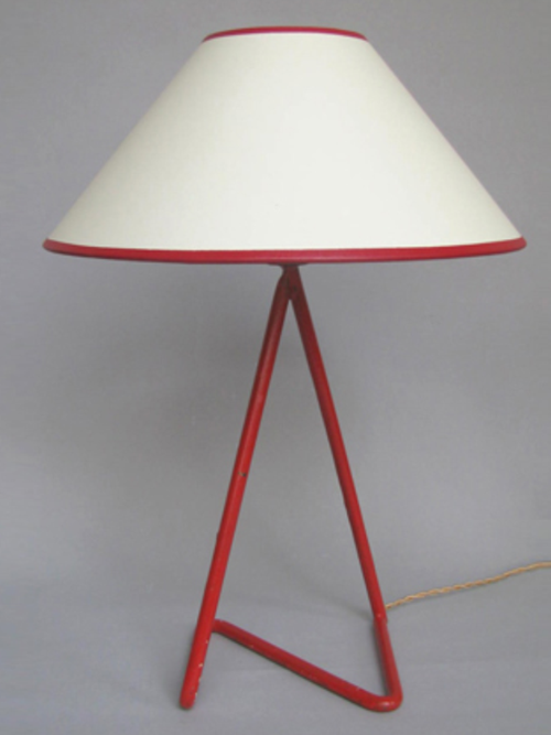 A highly prolific and dynamic period for design, the 1940’s to 1960’s produced a plethora of beautiful and striking pieces which were pivotal in the development of mid century design. Here are some light designs we find particularly inspiring.
This &#8216;Zig Zag&#8217; lamp (c. 1948) by Jean Royere, one of a pair is a remarkable example of early post war design. The lacquered metal base with its strong geometric shape softened by the curved angles is decisive in form while the bold use of red strikes a resonant note.  Innovative and striking, the distinct design is still profoundly relevant today.  