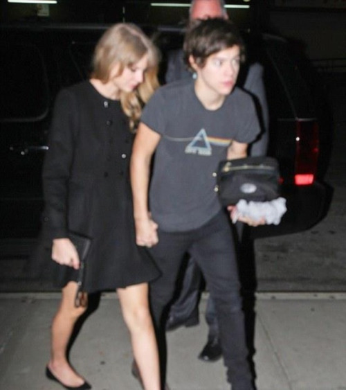 Harry and Taylor arriving at her hotel.