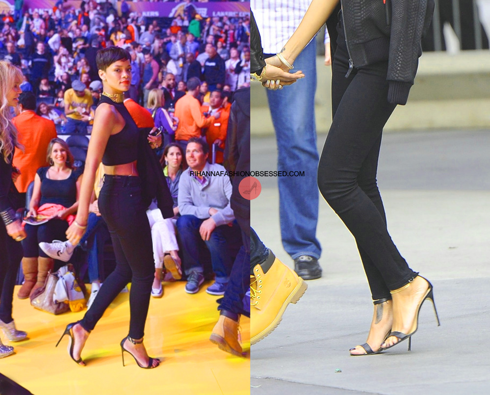 Rihanna spent her Christmas day yesterday at the New York Knicks vs Los Angeles Lakers game. The singer wore black from head toe, casual and sexy in a Christian Lacroix vintage gold chain detail chocker, a cropped top by designer Balmain with a pair slender fitting skinny Jeans by citizens of humanity and completed her look with a pair Manolo Blahnik strap sandals and a Trapstar python print bomber jacket.