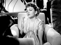 claudette colbert taking off shoes gif