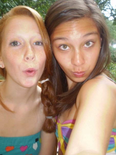 the girl on the left looks a bit unclear on the concept of duckface.