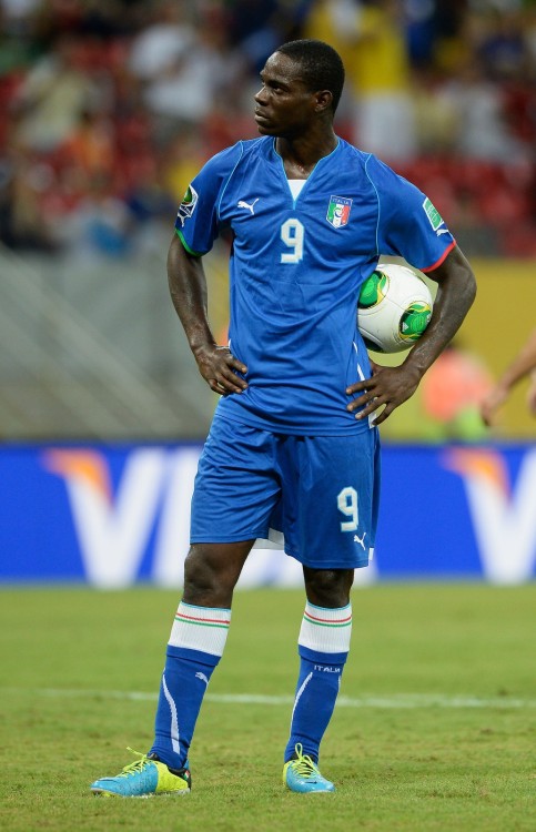 RECIFE, BRAZIL - JUNE 19:  Mario Balotelli of Italy looks on during the FIFA Confederations Cup Brazil 2013 Group A match between Italy and Japan at Arena Pernambuco on June 19, 2013 in Recife, Brazil.  (Photo by Claudio Villa/Getty Images)