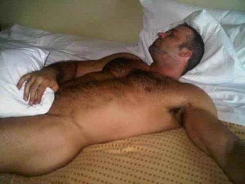 Gay men sleeping naked