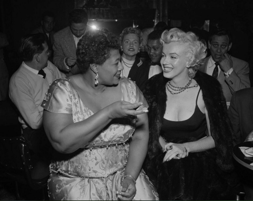  I never get tired of this photo. Ella Fitzgerald was not allowed to play at Mocambo because of her race. Then, one of Ella’s biggest fans made a telephone call that quite possibly changed the path of her career for good. Here, Ella tells the story of how Marilyn Monroe changed her life: “I owe Marilyn Monroe a real debt… she personally called the owner of the Mocambo, and told him she wanted me booked immediately, and if he would do it, she would take a front table every night. She told him – and it was true, due to Marilyn’s superstar status – that the press would go wild. The owner said yes, and Marilyn was there, front table, every night. The press went overboard. After that, I never had to play a small jazz club again. She was an unusual woman – a little ahead of her times. And she didn’t know it.” 