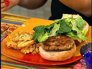 Tonight, my friend Matt is coming for dinner.  I am making Chicken Caesar Burgers (Rachel Ray) and it is going to be delicious! For the burgers (serves 4): 1&#160;1/4 pounds ground chicken breast, the average weight of 1 package 3 garlic cloves, 2 finely chopped, 1 cracked from skin 4 anchovies, finely chopped (optional  but recommended) A handful of Parmigiano Reggiano Salt and coarse black pepper 1 tablespoon Worcestershire sauce A handful flat-leaf parsley, chopped 1 tablespoon lemon zest plus juice of 1/2 lemon 1/4 cup extra-virgin olive oil (EVOO), plus some for drizzling 1 teaspoon Dijon mustard 1 heart romaine lettuce, chopped 2 plum tomatoes, thinly sliced 4 crusty rolls, split in half 