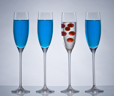 3 blue flutes and 1 with cherries 