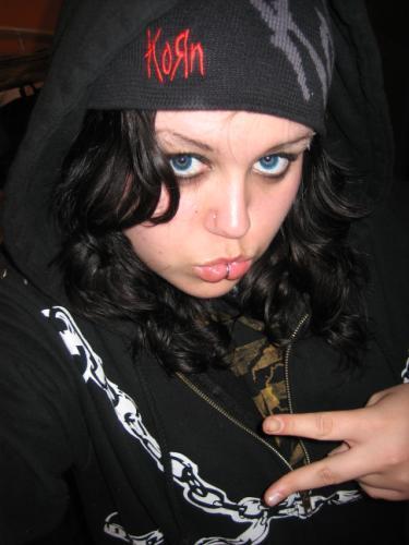 okay, sweetie, we know you think you&#8217;re all goth as fuck in this pic, but the korn hat and the hot topic wardrobe do not in any way pass for goth. it&#8217;s really cute how your lip ring is actually trying to pull your mouth out of duckface mode. and by &#8220;cute,&#8221; we mean &#8220;really fucking weird-looking, and don&#8217;t ever do that again, because it&#8217;s kind of grossing us out, ok?&#8221; thank goodness you claim to have come to your senses.
