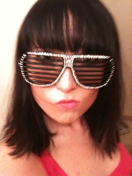duckface + these sunglasses symbolize pretty much everything we hated most about 2009.