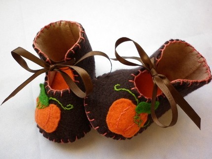 Pumpkin Items for Baby: My favorite thing about fall has to be pumpkins! They look like toys, grow in a fun patch, and look oh-so-adorable on all these fun shoes, bags, and clothes. Those pumpkin slippers must be mine! (via lilsugar)  - Tutu Couture, Fashion