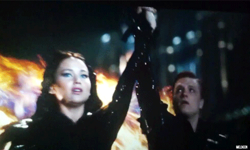 i-knead-peetas-bread: LOOK AT HOW PEETA LOOKS AT THEIR HANDS. HE CAN’T BELIEVE HE’S FINALLY TOUCHING HER, HOLDING HER HAND. THE GIRL HE LOVES. I CAN’T- 