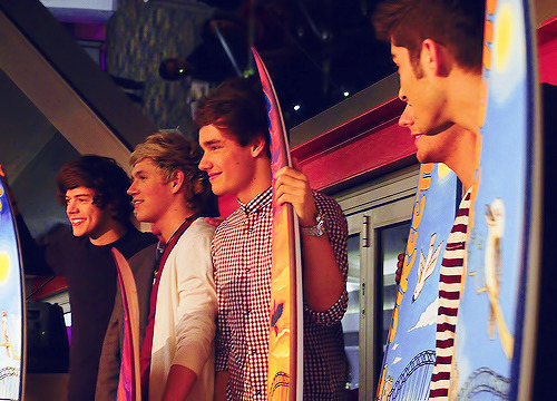  The boys recieving their surf boards. [x] 