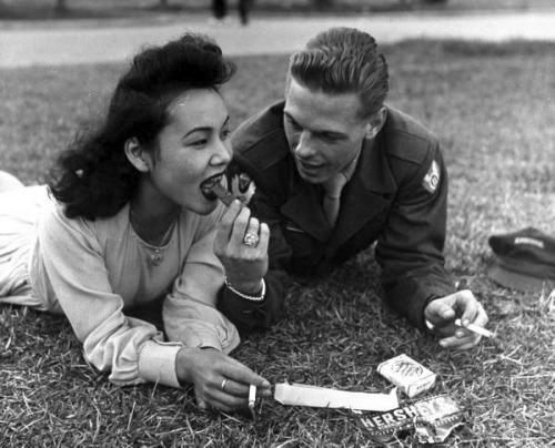 staygld: milktree: aclockworkorange: A soldier and a local girl share a chocolate bar and cigarettes, 1946. im gonna cry this is gorgeous! omg am i twisted that i would want this to happen to me? like i wouldn&#8217;t want war but imagine a hot foreign soldier befriending you and he&#8217;s got a thick accent and he&#8217;s all romantic and asdfhauisdhsif omg i fantasize too much