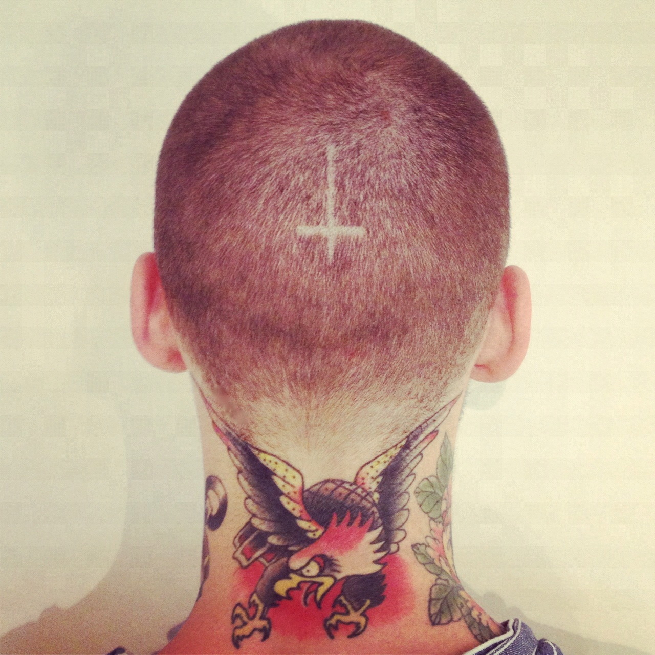mikeypearson: Scissor over comb and upside down cross today at work.