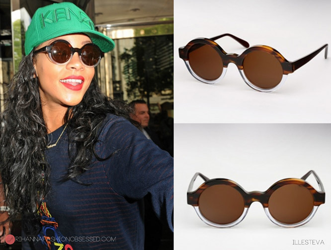 UPDATE: Managed to find Rihanna&#8217;s eyewear she was spotted wearing in London on Tuesday. They are by New York label duo Illesteva&#8217;s Frieda &#8216;half half&#8217; round sunglasses available for $200.00 from eyegoodies.com.
You can check out the rest of Rihanna&#8217;s outift from Tuesday HERE