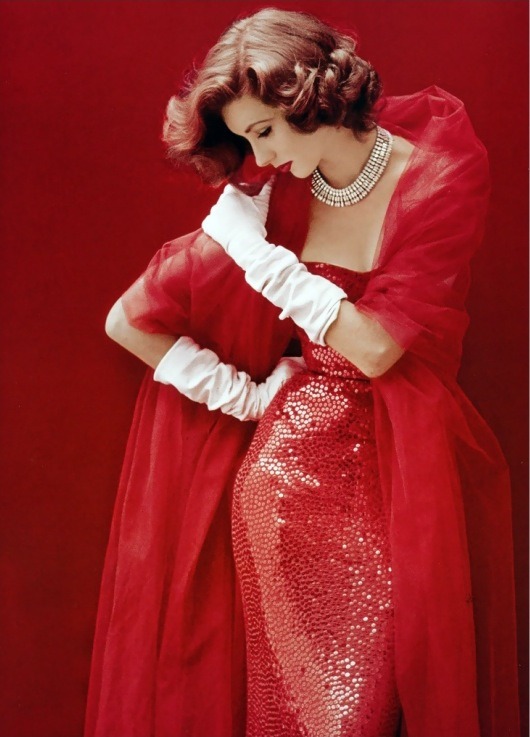 madamedevereshideaway:Not the outfit to play shy inPhoto of Suzy Parker in dress by Norman Norell, by Milton Greene