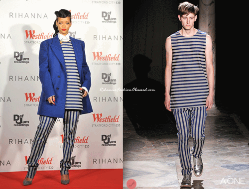 Rihanna turned on the Christmas lights at Westfield Stratford City shopping center in London, England, wearing a blue coat by Raf Simons, with striped top and pants from  Acne.