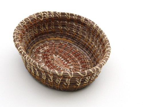 Coiled pine needle basket, with embroidery floss! Looks complicated, but it is really accessible for beginner basket-makers. I will be co-teaching a workshop on coiled basketry in january so look for updates! 